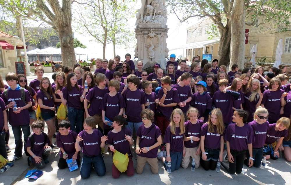 Monarch Treats Schoolchildren